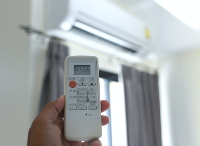 People are using the remote control air conditioner.